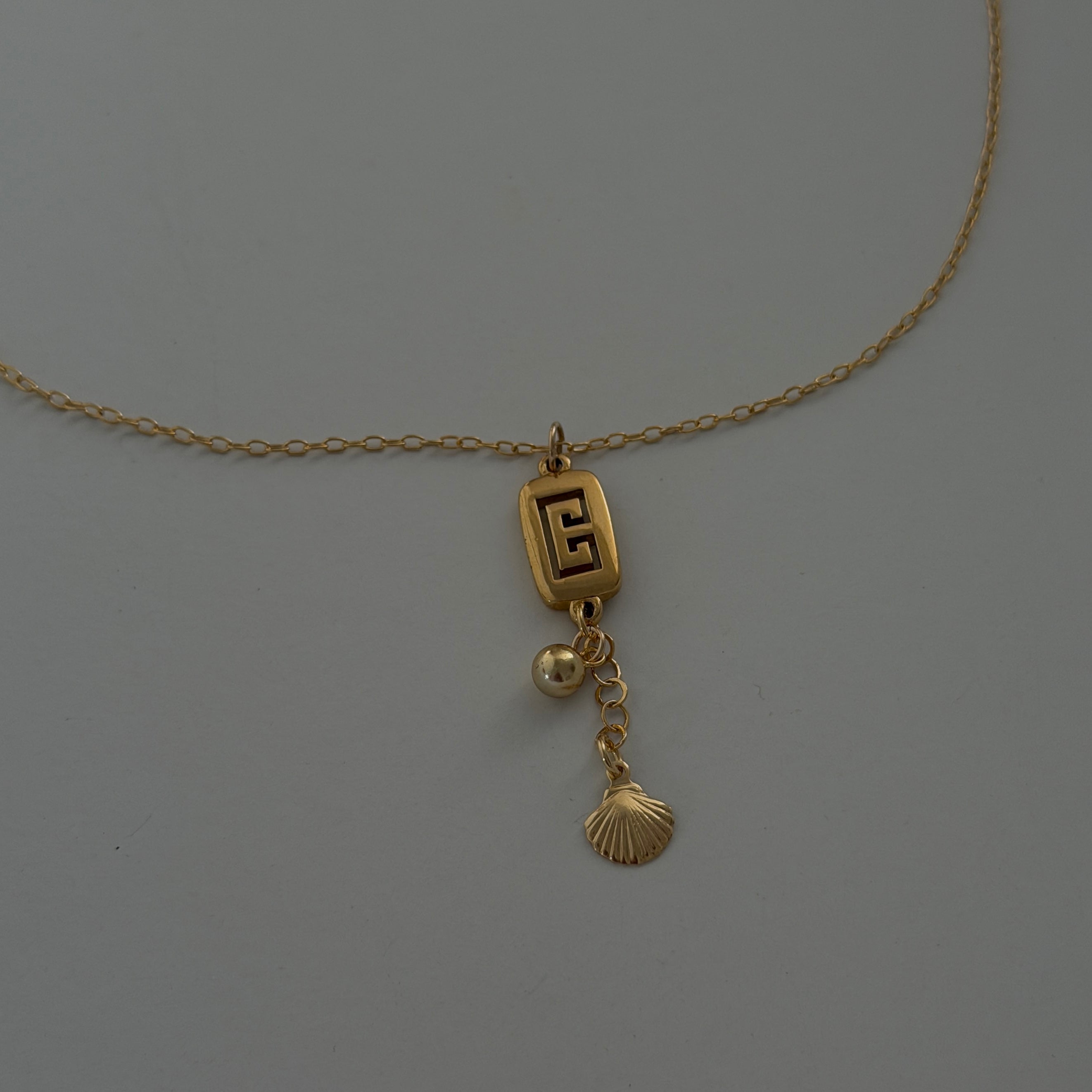 Vintage Givenchy Dangle Charm Pendant Necklace – Re-Dunne