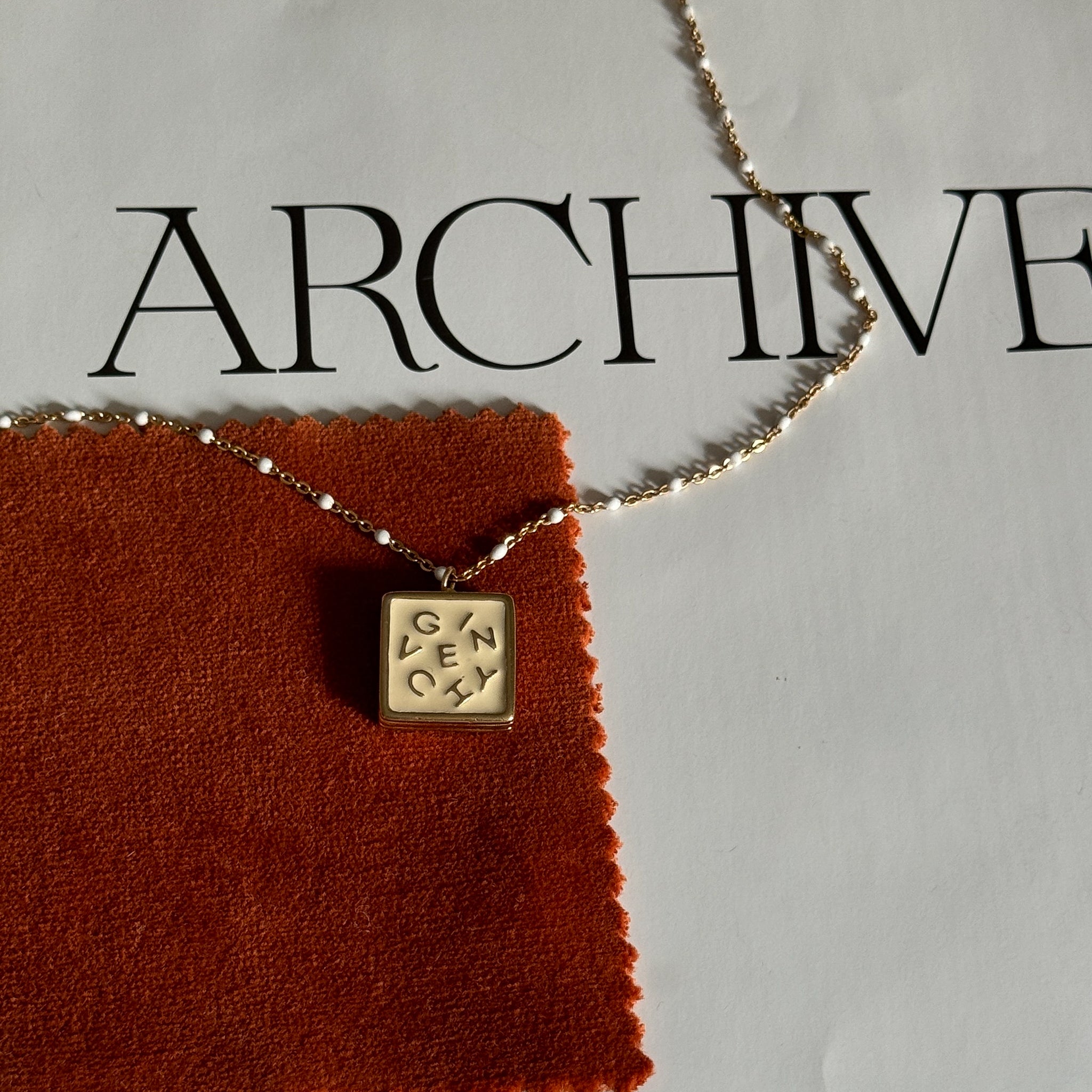 Vintage Givenchy Cream Letter Logo Square Pendant Necklace. Designer Luxury. Repurposed. Authentic.