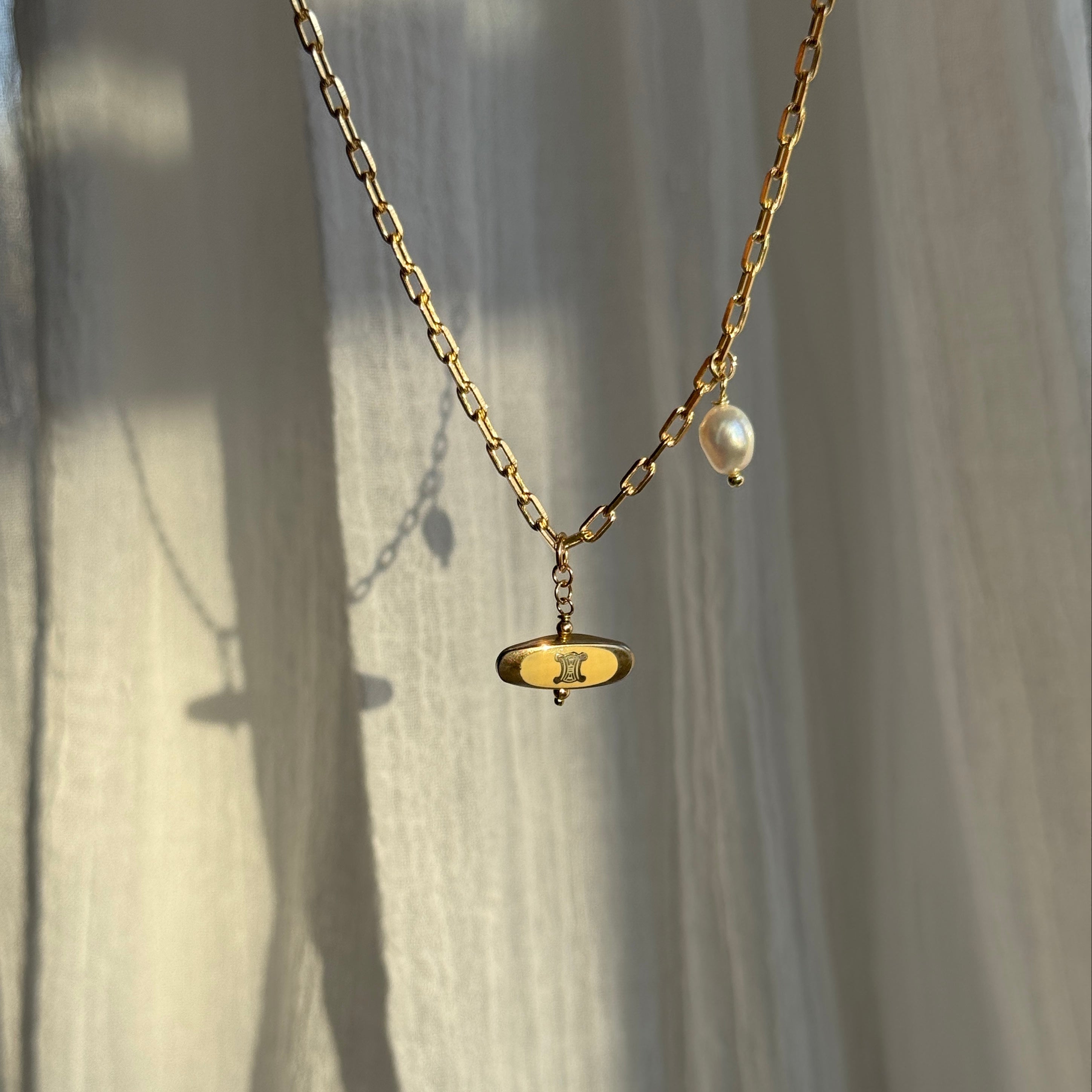 Vintage Cartier Authentic Gold Charm Necklace featuring keshi pearl detailing